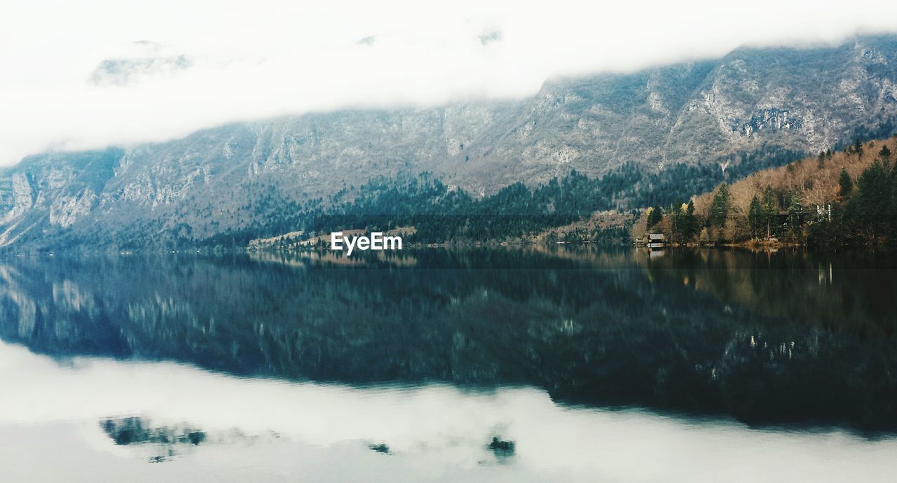 Reflection of majestic mountains in lake