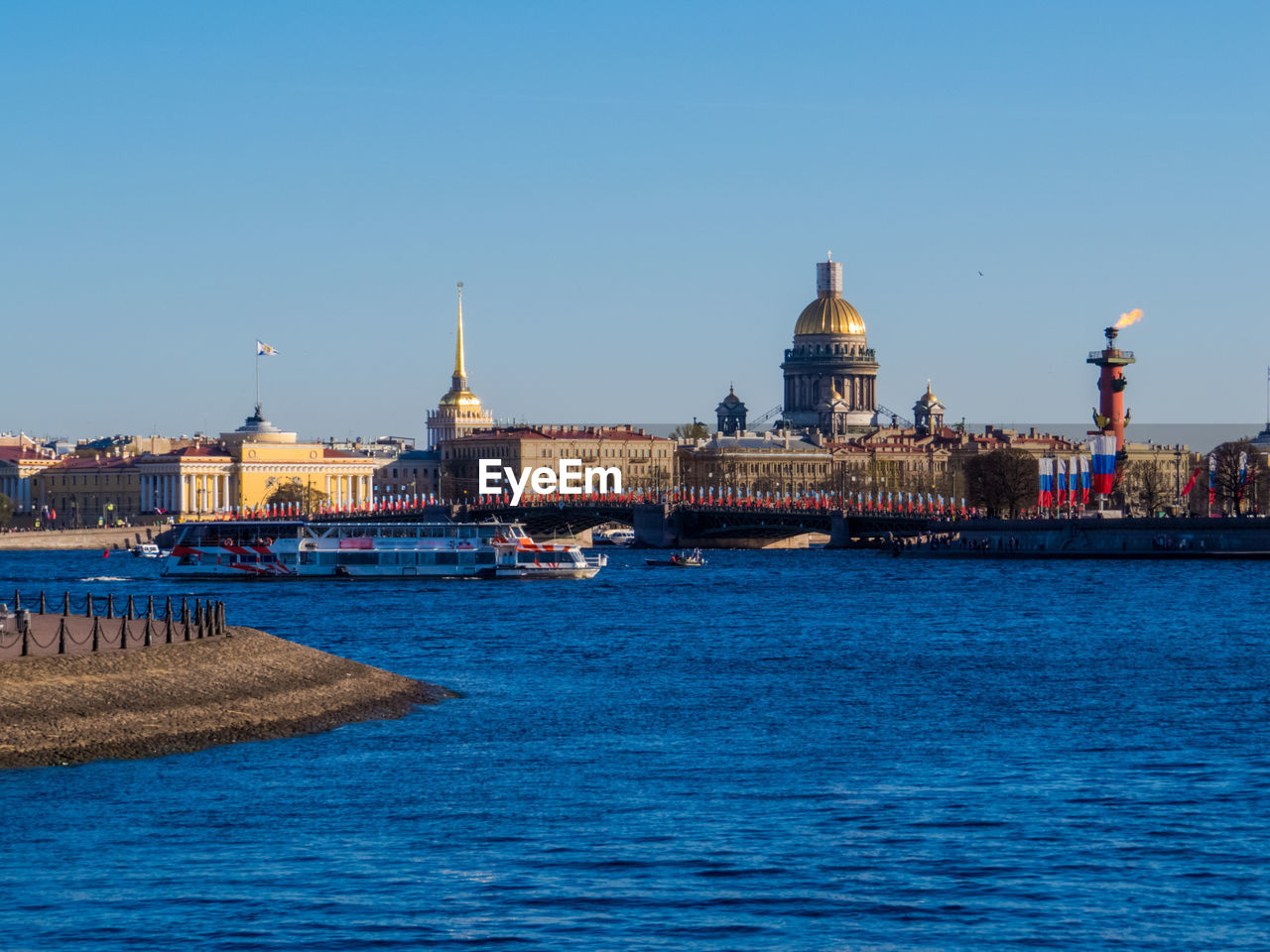 VIEW OF BUILDINGS AGAINST BLUE SKY