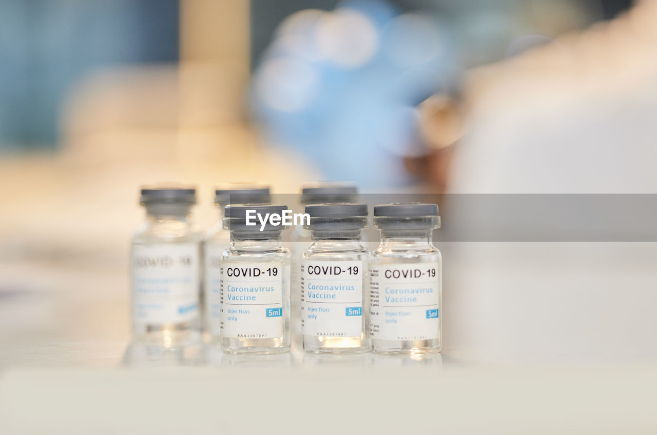 Close-up of covid-19 vaccine bottles