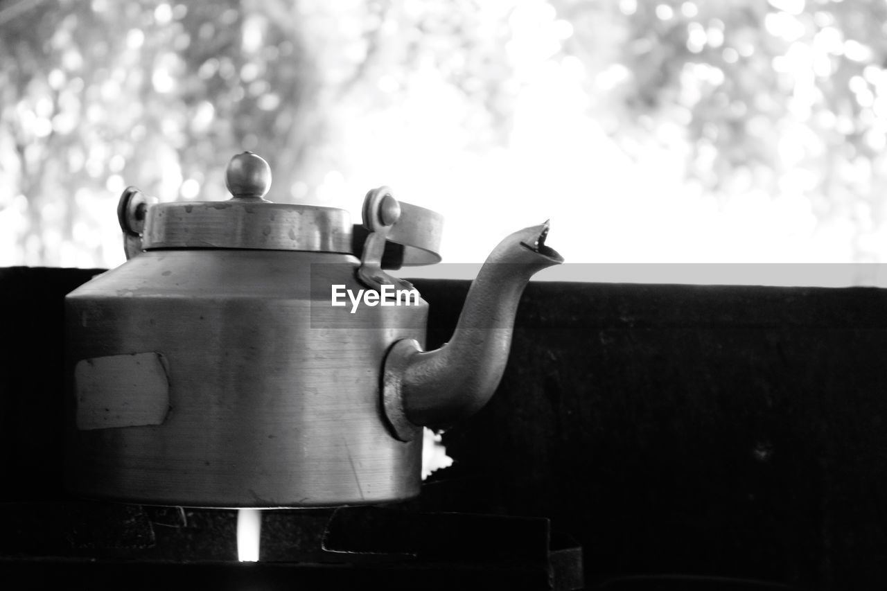 Close-up of tea pot on stove