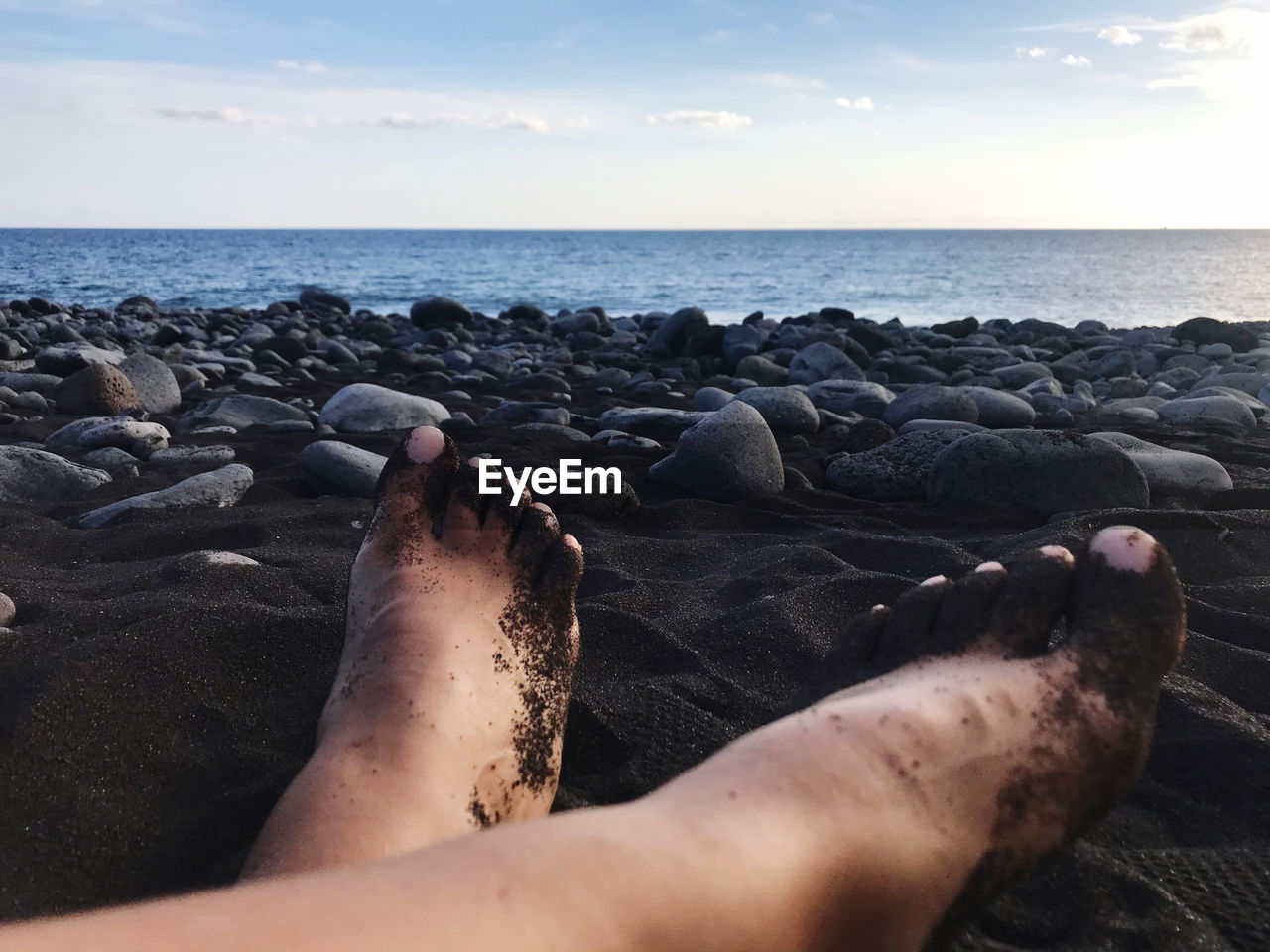 Low section of person on beach