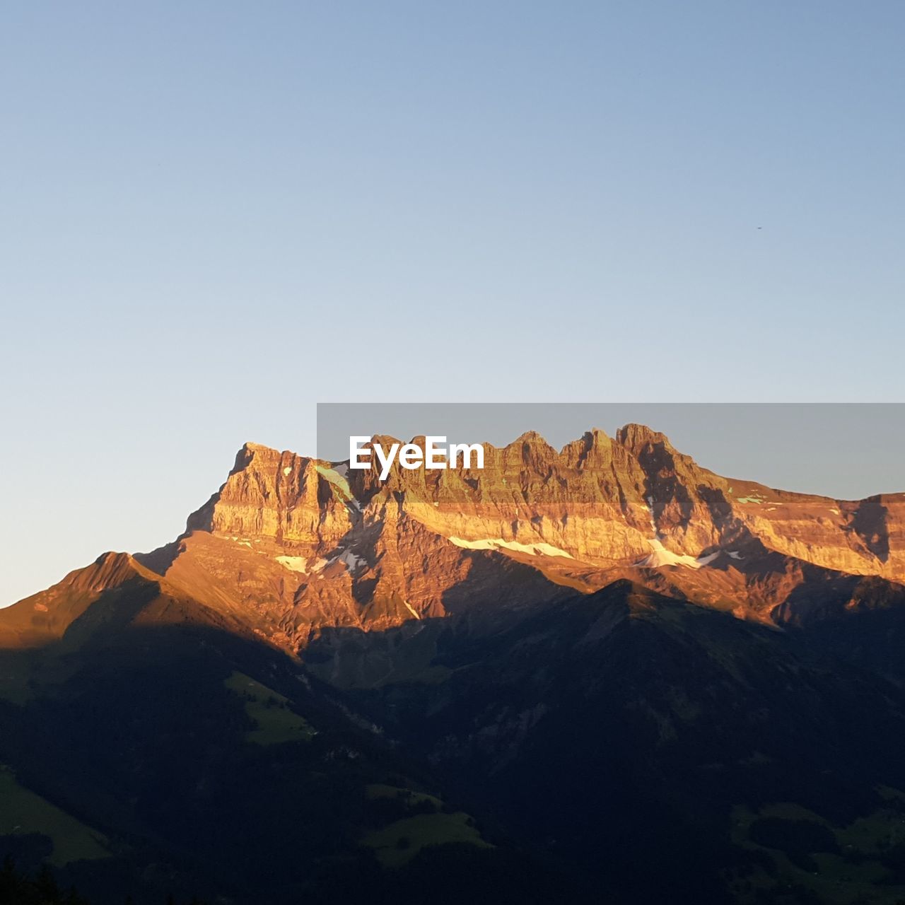 Scenic view of mountains against clear sky