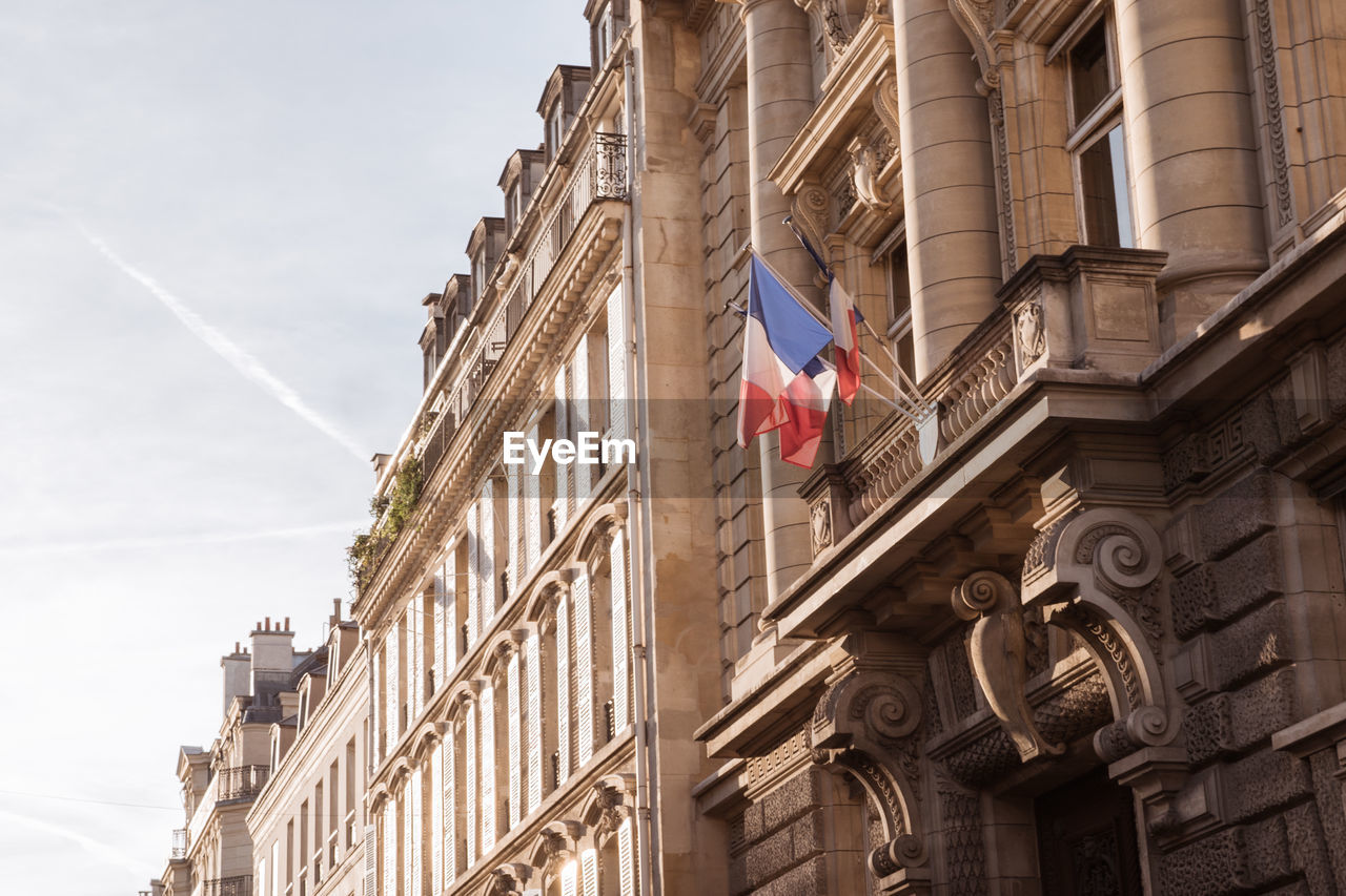 LOW ANGLE VIEW OF FLAG AGAINST SKY