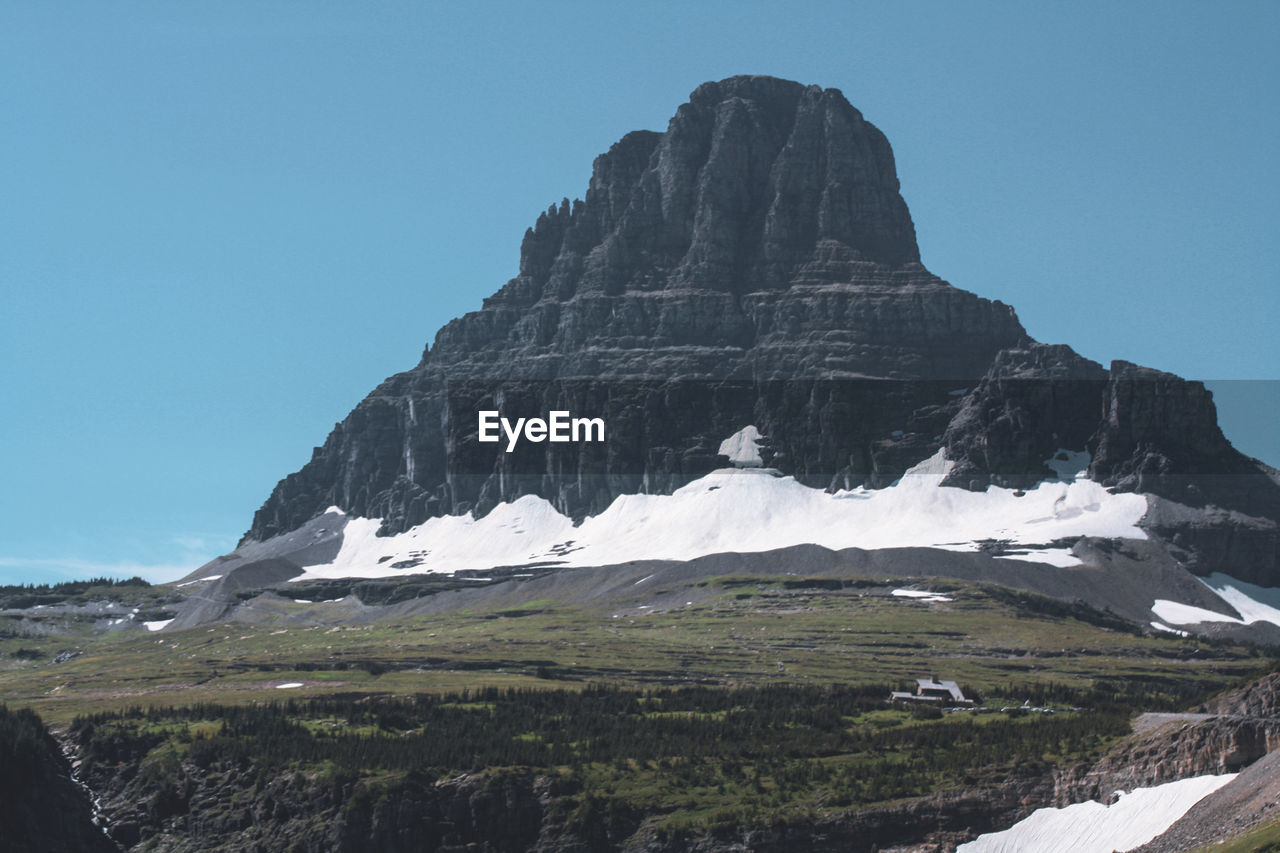 Scenic view of mountains against clear sky