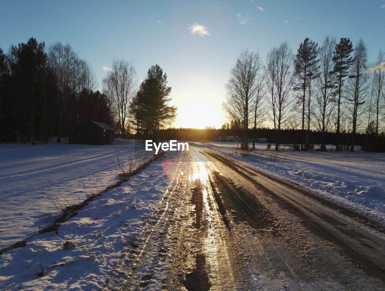 VIEW OF SNOW COVERED LANDSCAPE