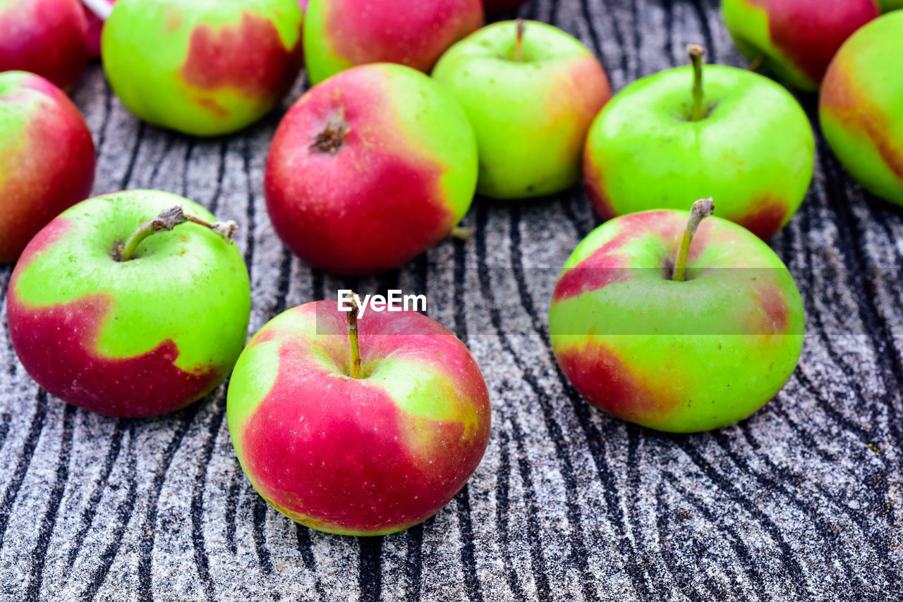 CLOSE-UP OF FRUITS ON TABLE