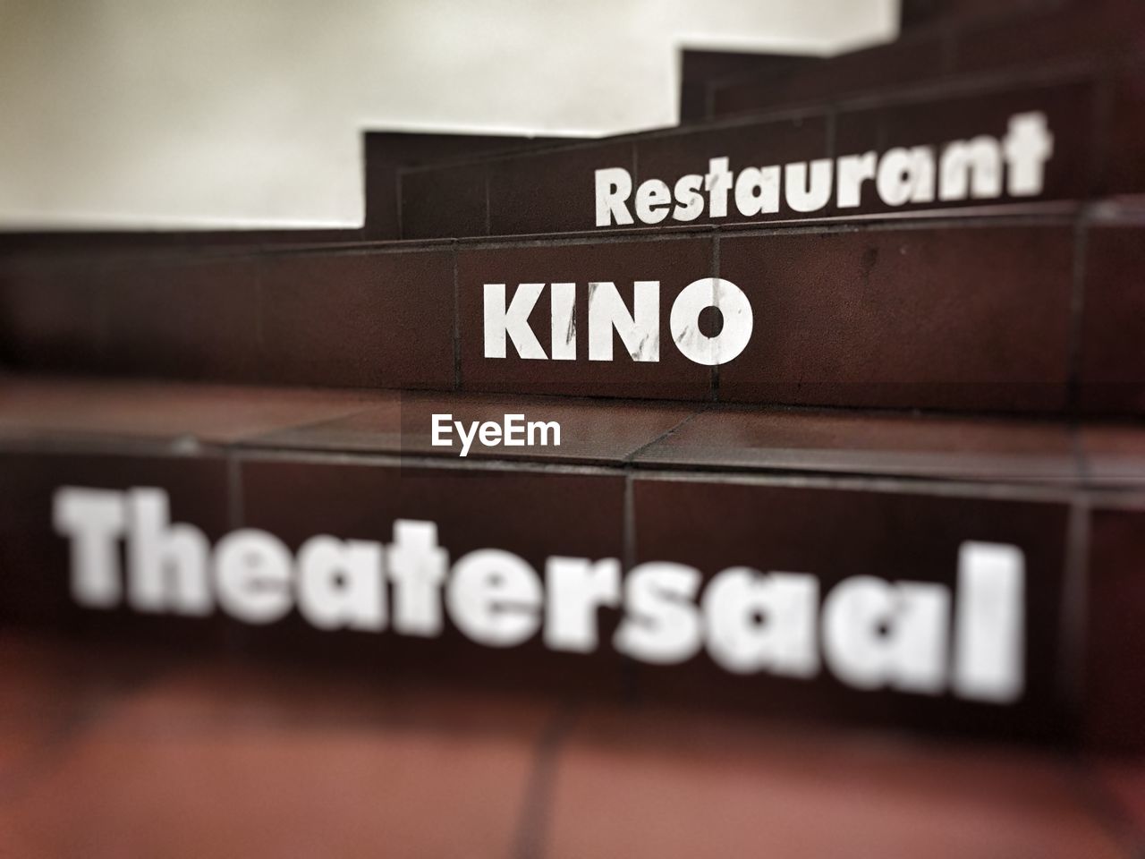 CLOSE-UP OF TEXT ON WALL