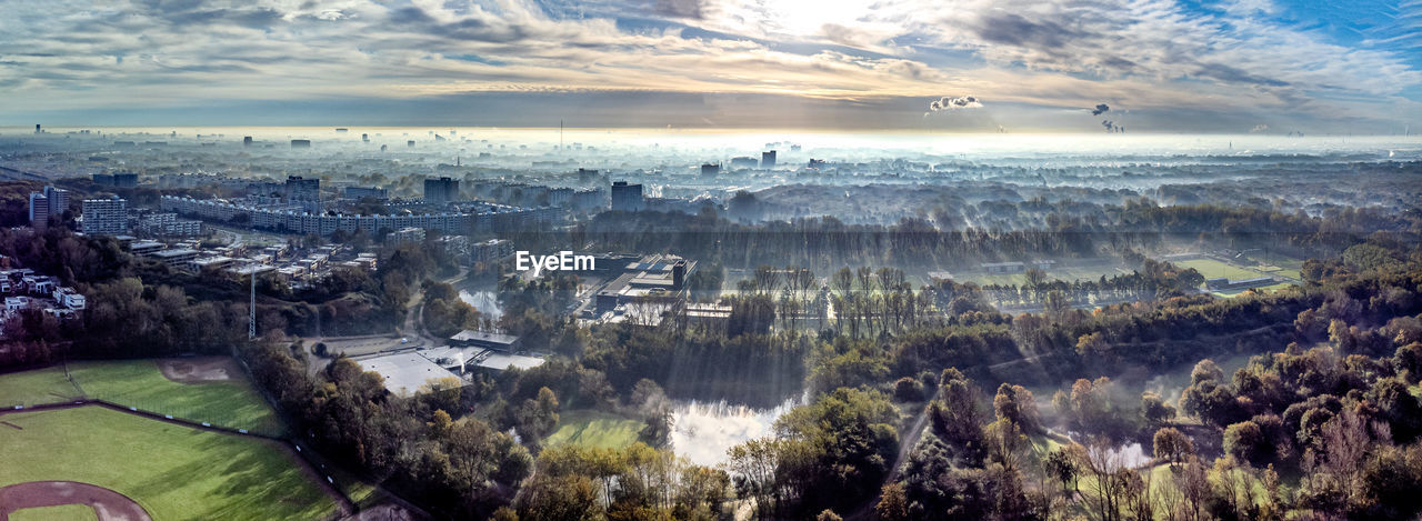 Aerial photo of a winter sunrise over the hague south west on a misty morning