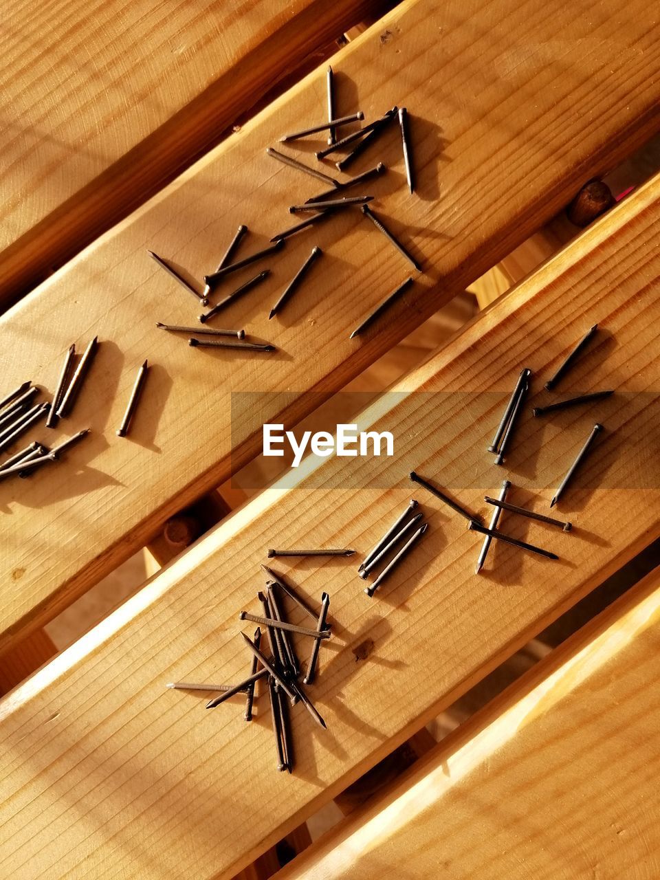 High angle view of nails on table