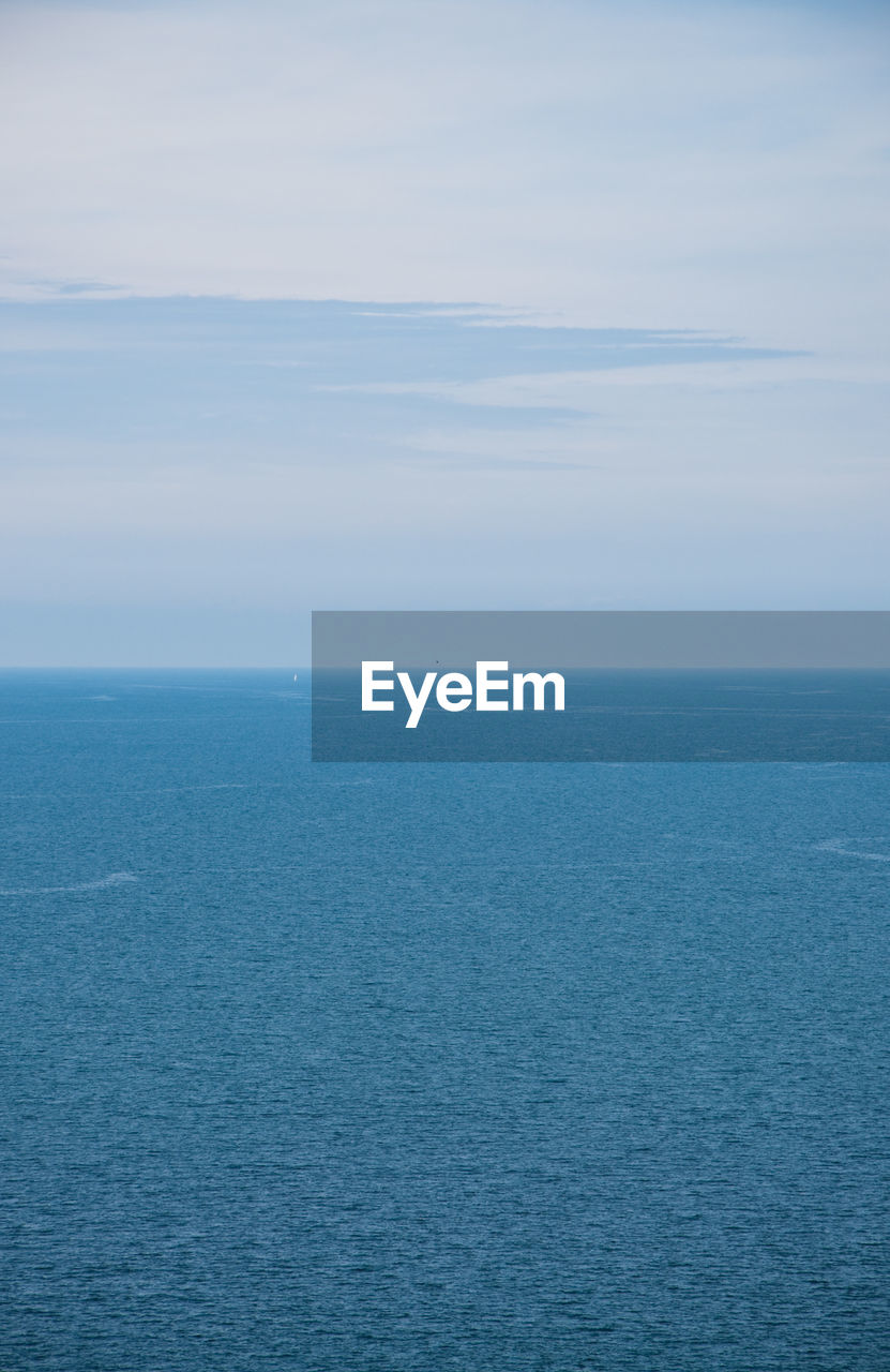 Idyllic view of seascape against sky