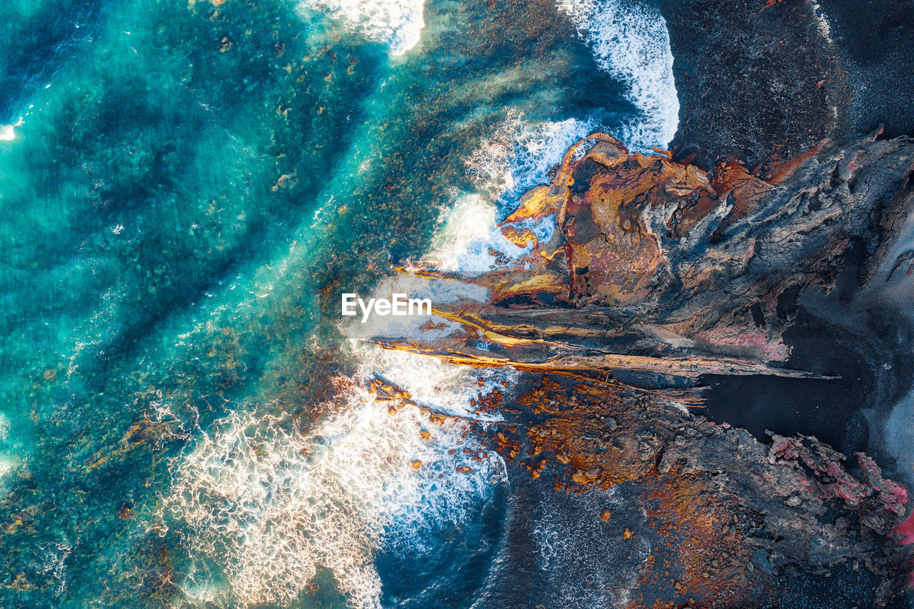 Full frame shot of rock in sea