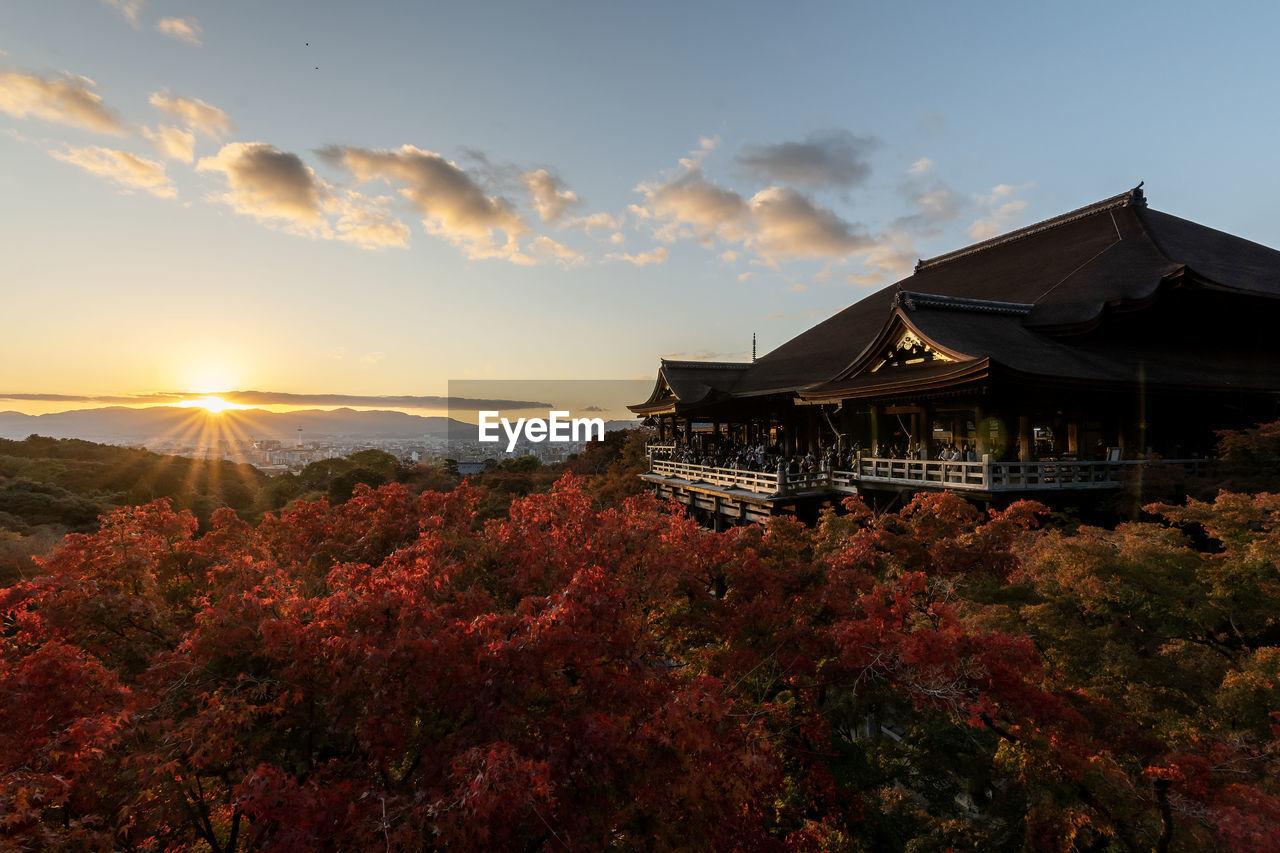 Scenic view of kiyomizu-dera temple against sky during sunset