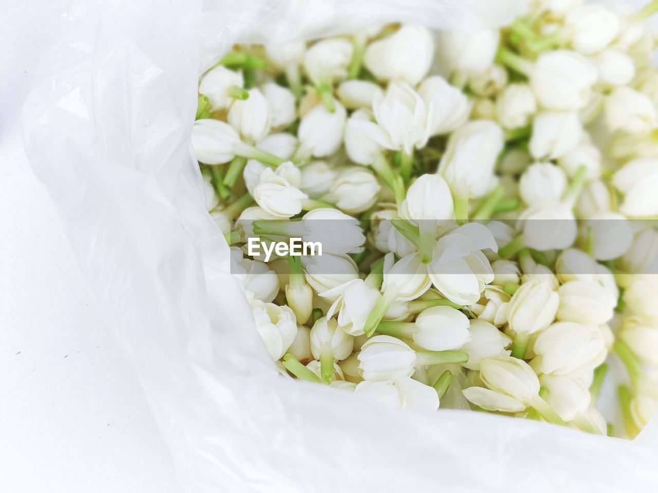 bouquet, flower, plant, white, petal, freshness, flowering plant, wedding, flower arrangement, lilac, nature, no people, event, floral design, indoors, beauty in nature, close-up, food and drink, green, yellow, floristry, cut flowers, studio shot, food, celebration, vegetable, flower head, bunch of flowers, still life, lavender