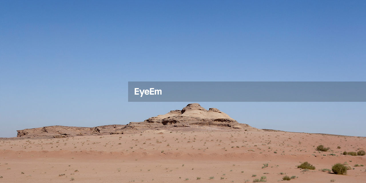 VIEW OF DESERT AGAINST CLEAR SKY