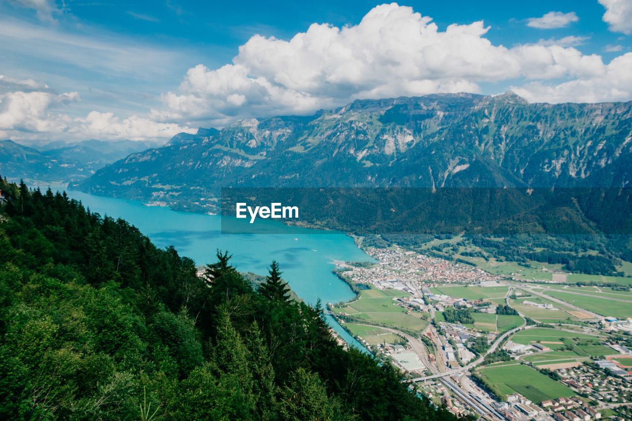 Scenic view of landscape and mountains against sky