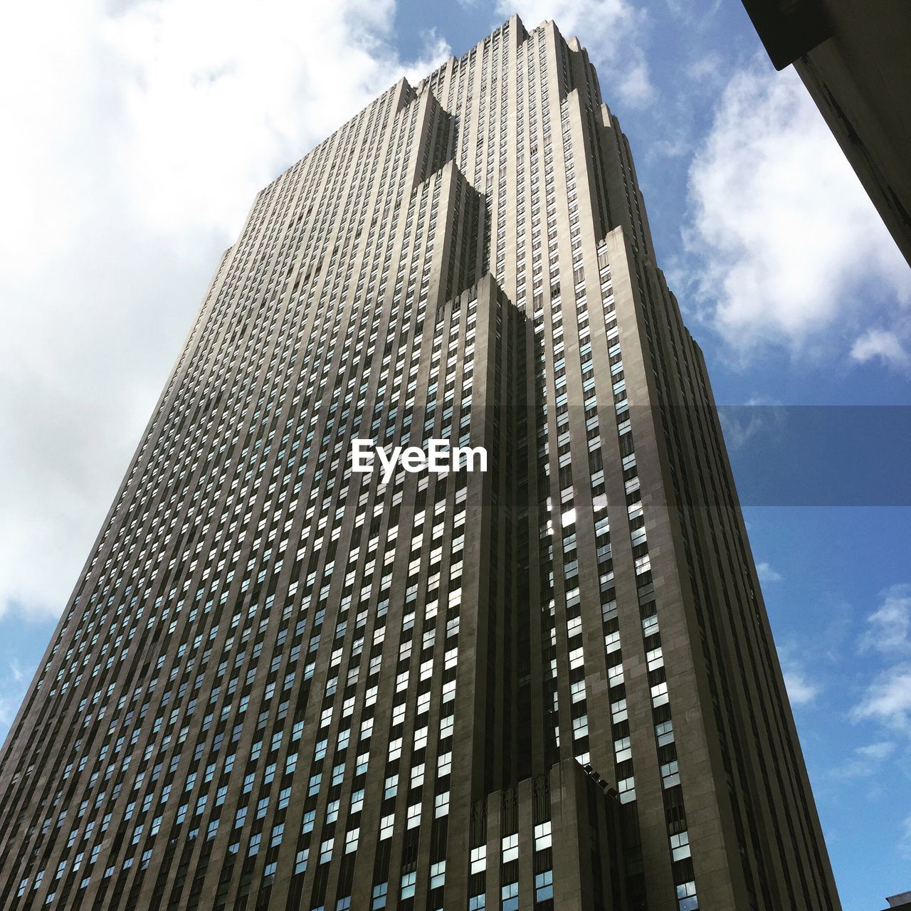 LOW ANGLE VIEW OF OFFICE BUILDING AGAINST SKY