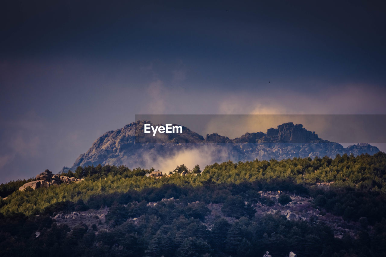 Scenic view of mountains against sky during sunset