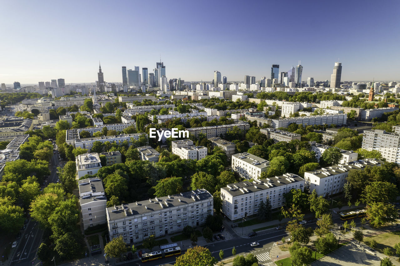 Beautiful panoramic drone view of the centre of modern warsaw with silhouettes of skyscrapers. 