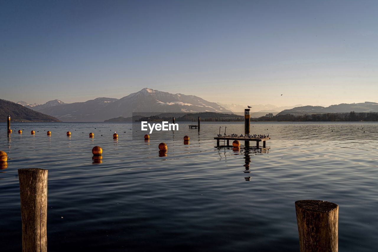 Scenic view of sea against clear sky lake lake of zug