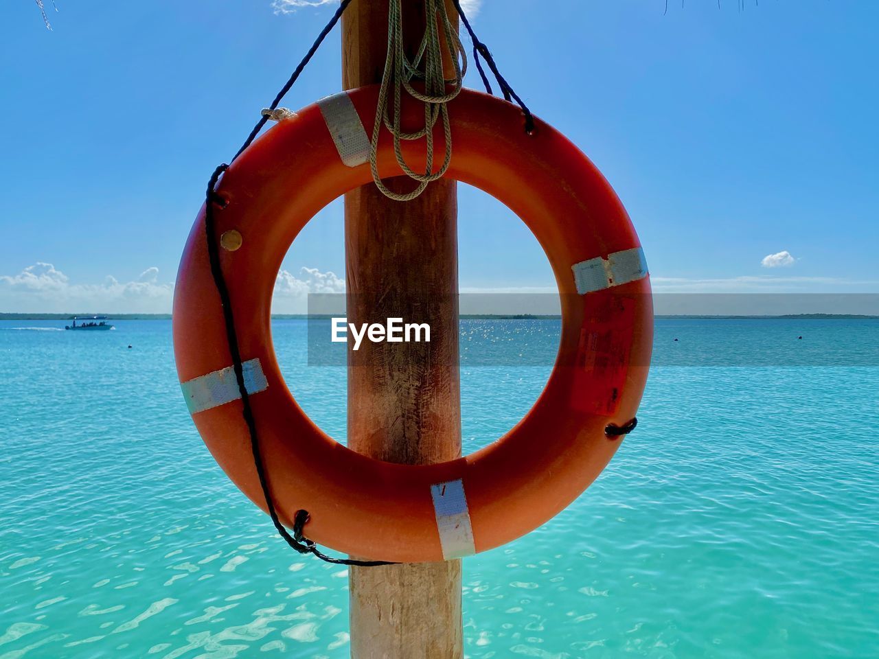 Life belt close up against sky and caribbean sea