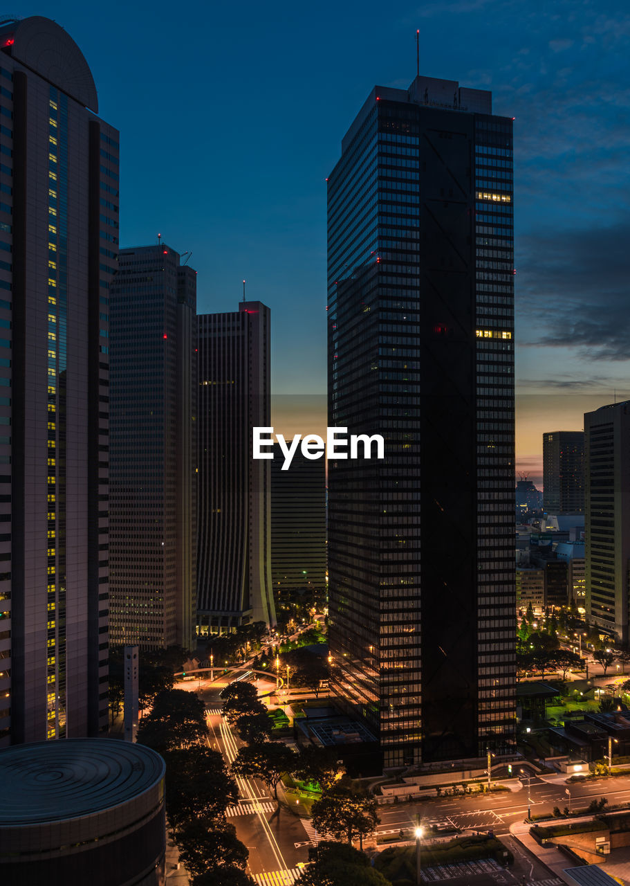 Skyscrapers in city at night