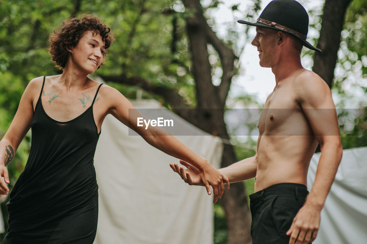 Young couple standing outdoors