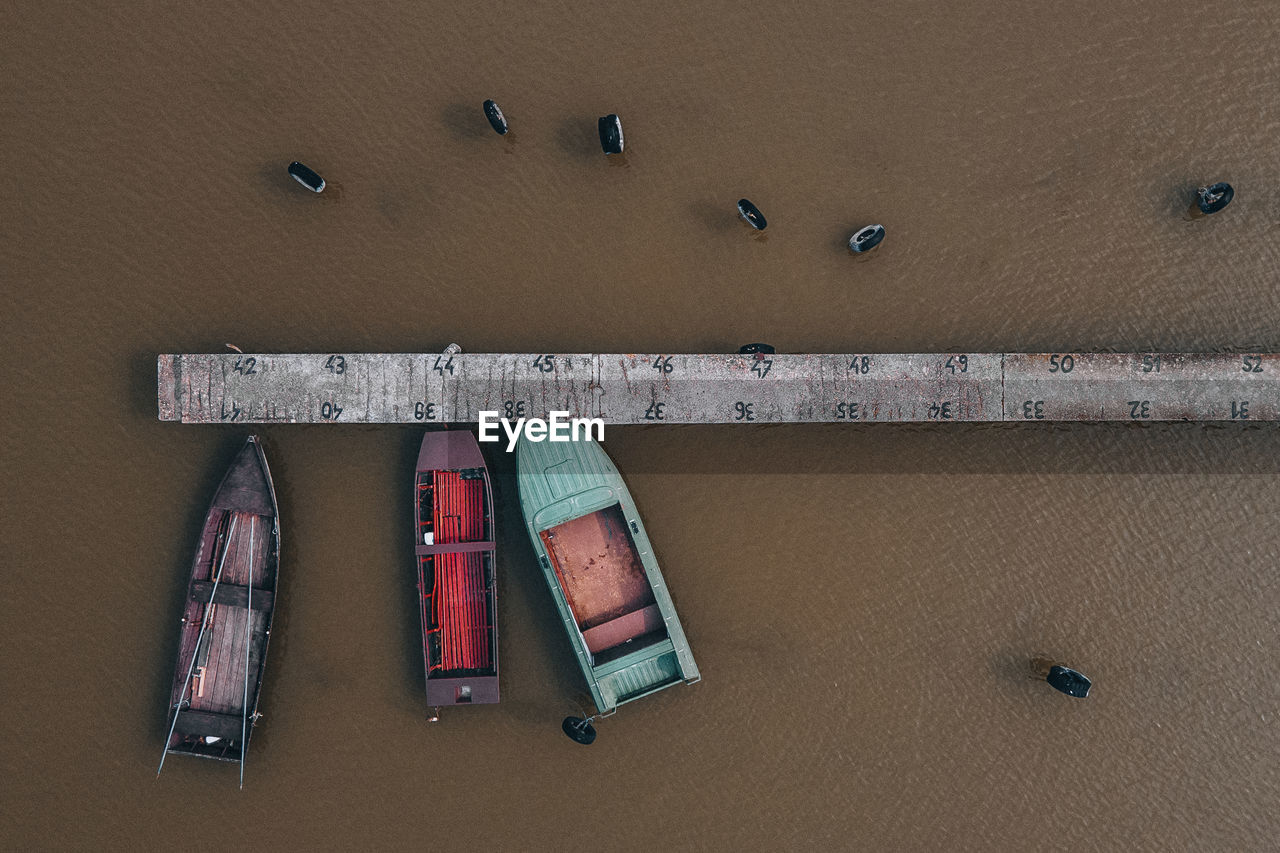 High angle view of boats docked at jetty