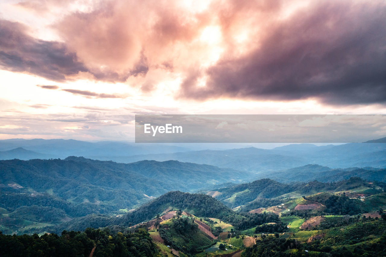 Aerial view of agricultural landscape against sky