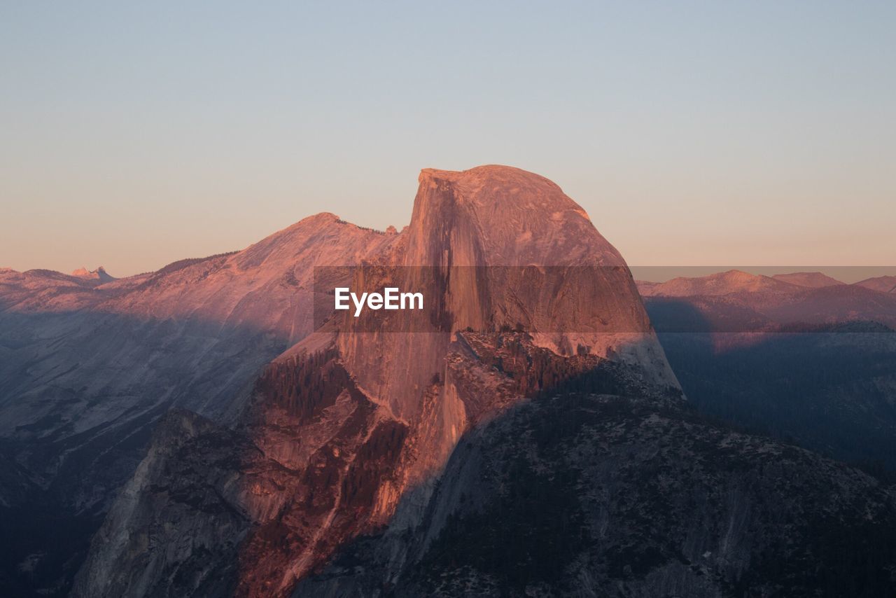 View of mountain range against clear sky