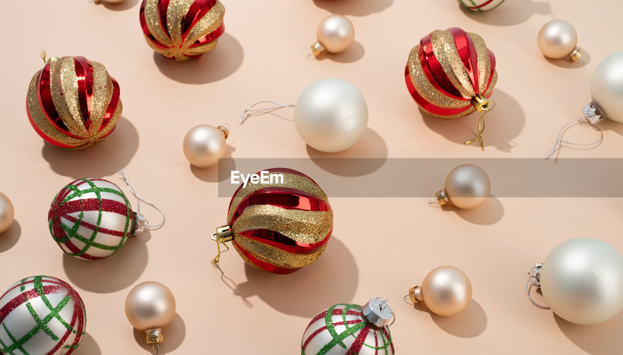 celebration, holiday, no people, decoration, multi colored, large group of objects, tradition, studio shot, variation, event, indoors, group of objects, sphere, egg, fashion accessory, still life, easter egg, christmas ornament, jewellery, high angle view, food