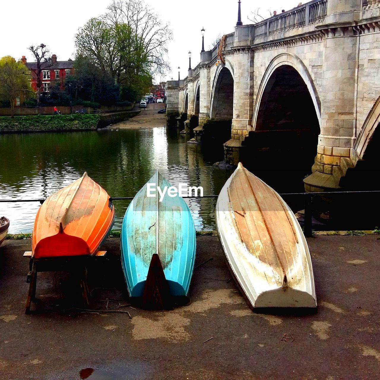 PANORAMIC VIEW OF BOATS IN RIVER