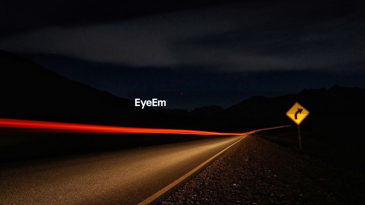 Light trails on road at night