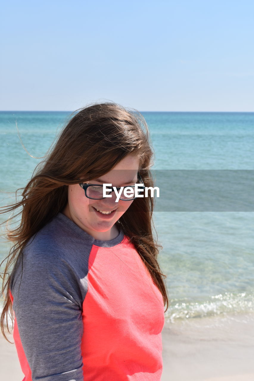 Headshit of a girl at the beach