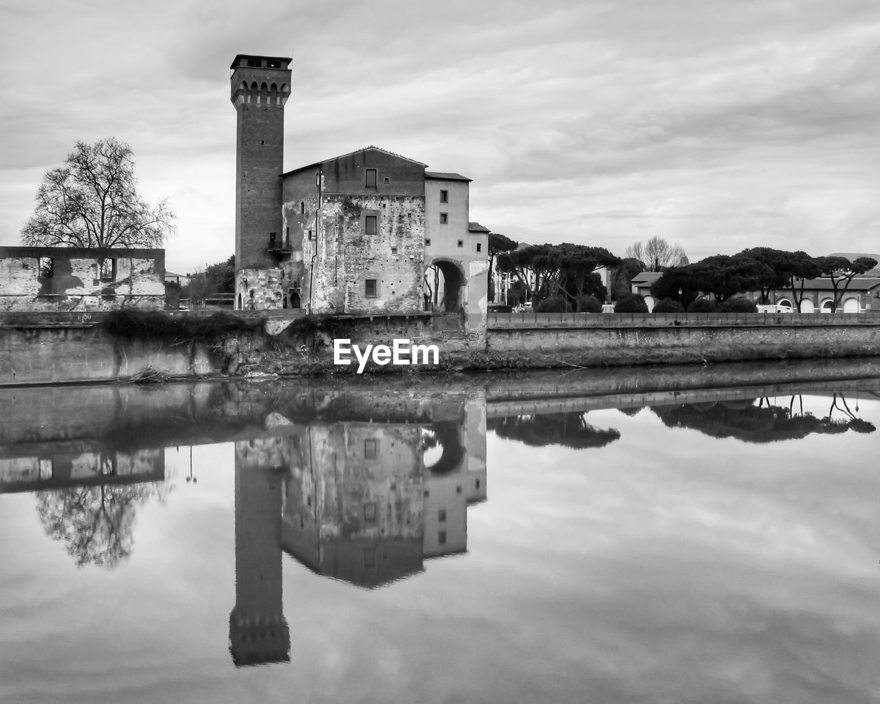 Reflection of old building in lake