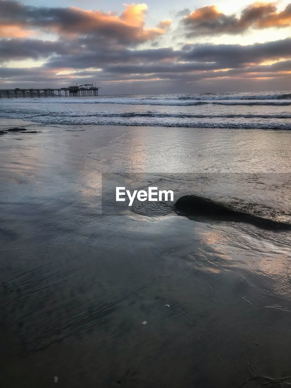 SCENIC VIEW OF SEA DURING SUNSET