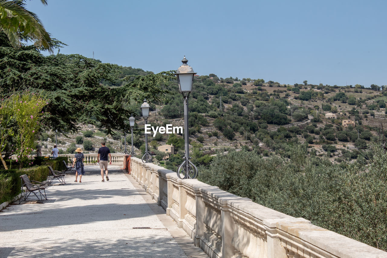 The street in the garden of ragusa ibla with its view over the hills