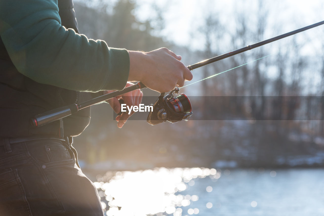 Fishing on the lake at sunset. fishing background.