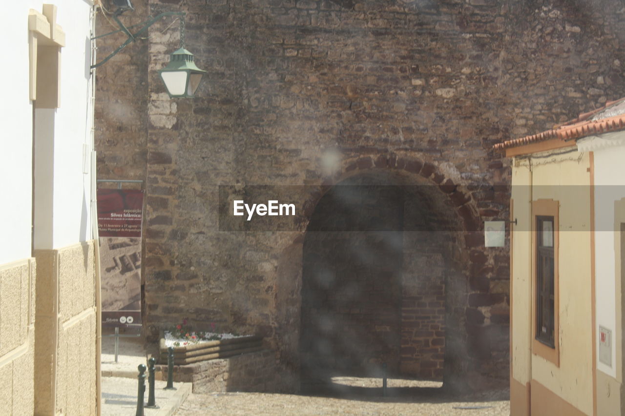 VIEW OF PEOPLE WALKING IN BUILDING