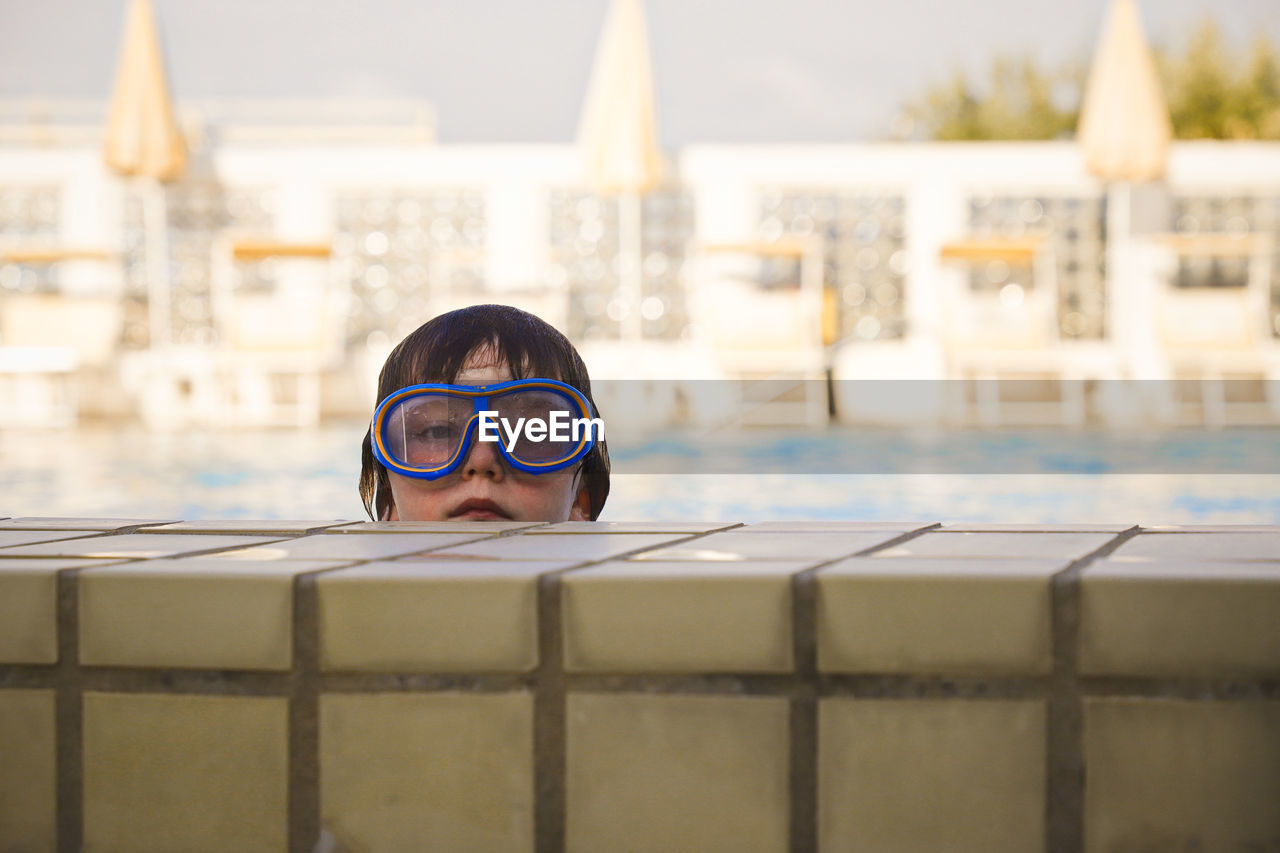 Portrait of boy in swimming pool