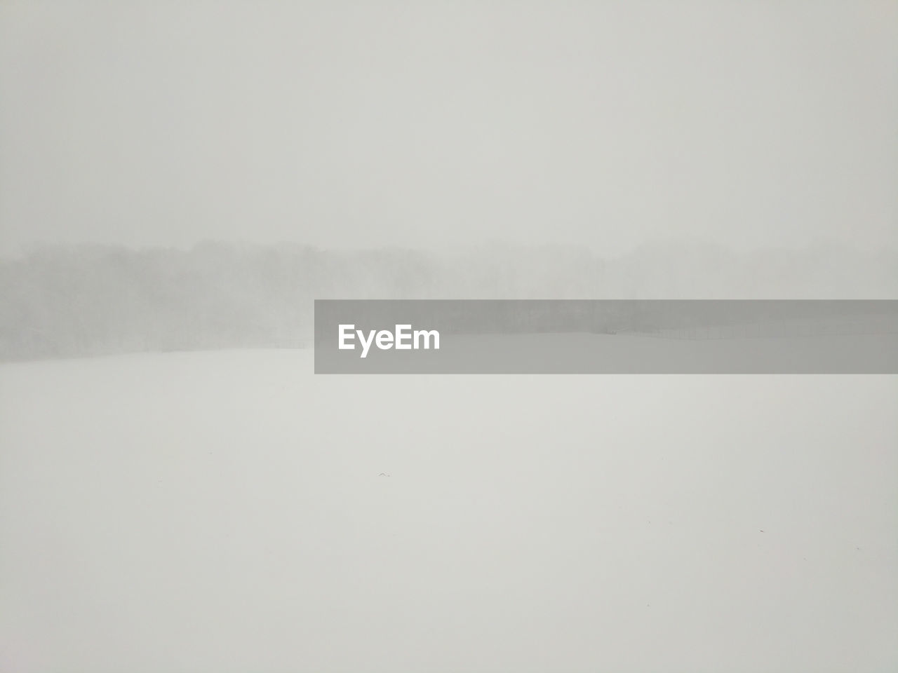 SNOW FIELD AGAINST SKY DURING WINTER