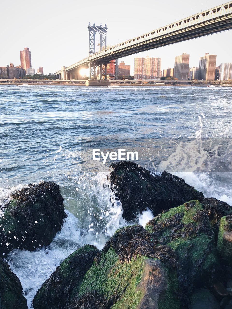 View of suspension bridge over sea