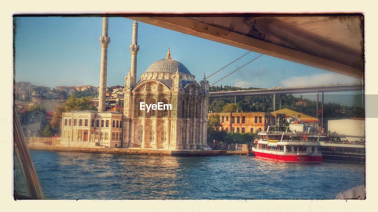 Ortakoy mosque at riverbank seen from boat