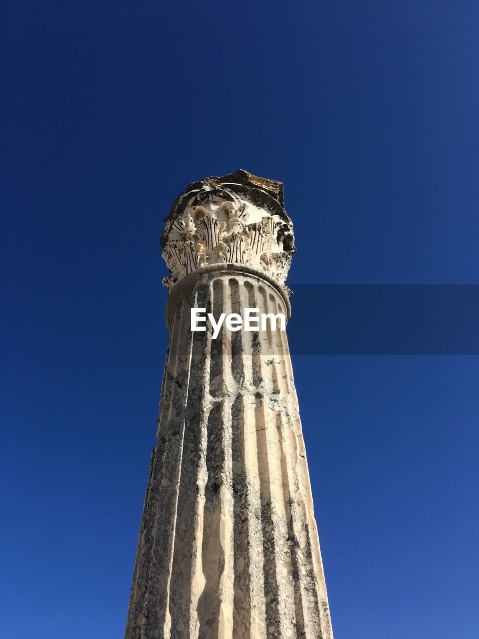 LOW ANGLE VIEW OF A STATUE