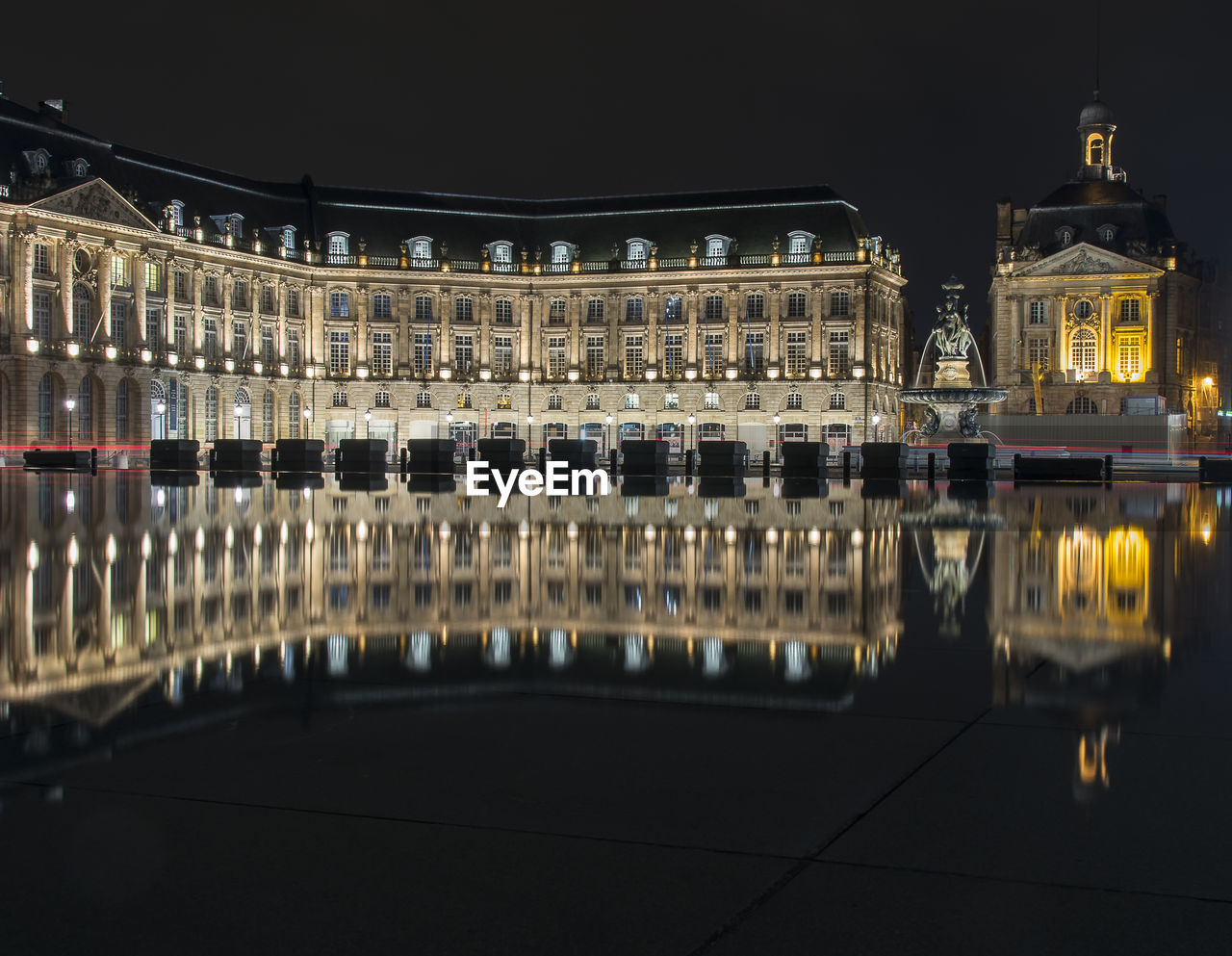 ILLUMINATED BUILDING AT NIGHT