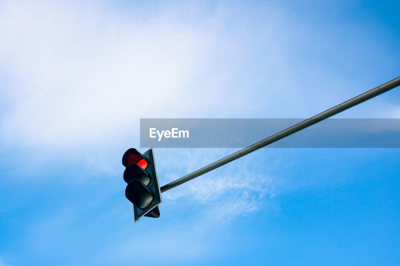 LOW ANGLE VIEW OF ROAD SIGNS AGAINST SKY