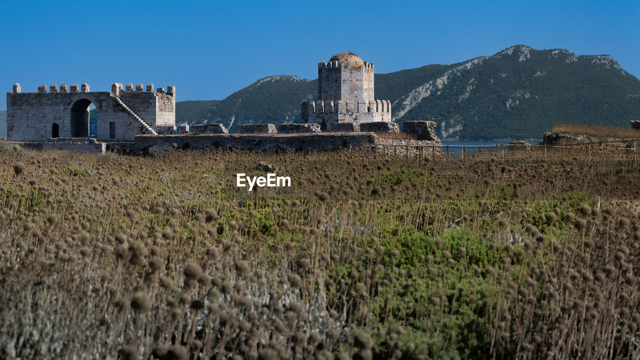 Bourtzi of methoni castle, view of old ruins against clear sky