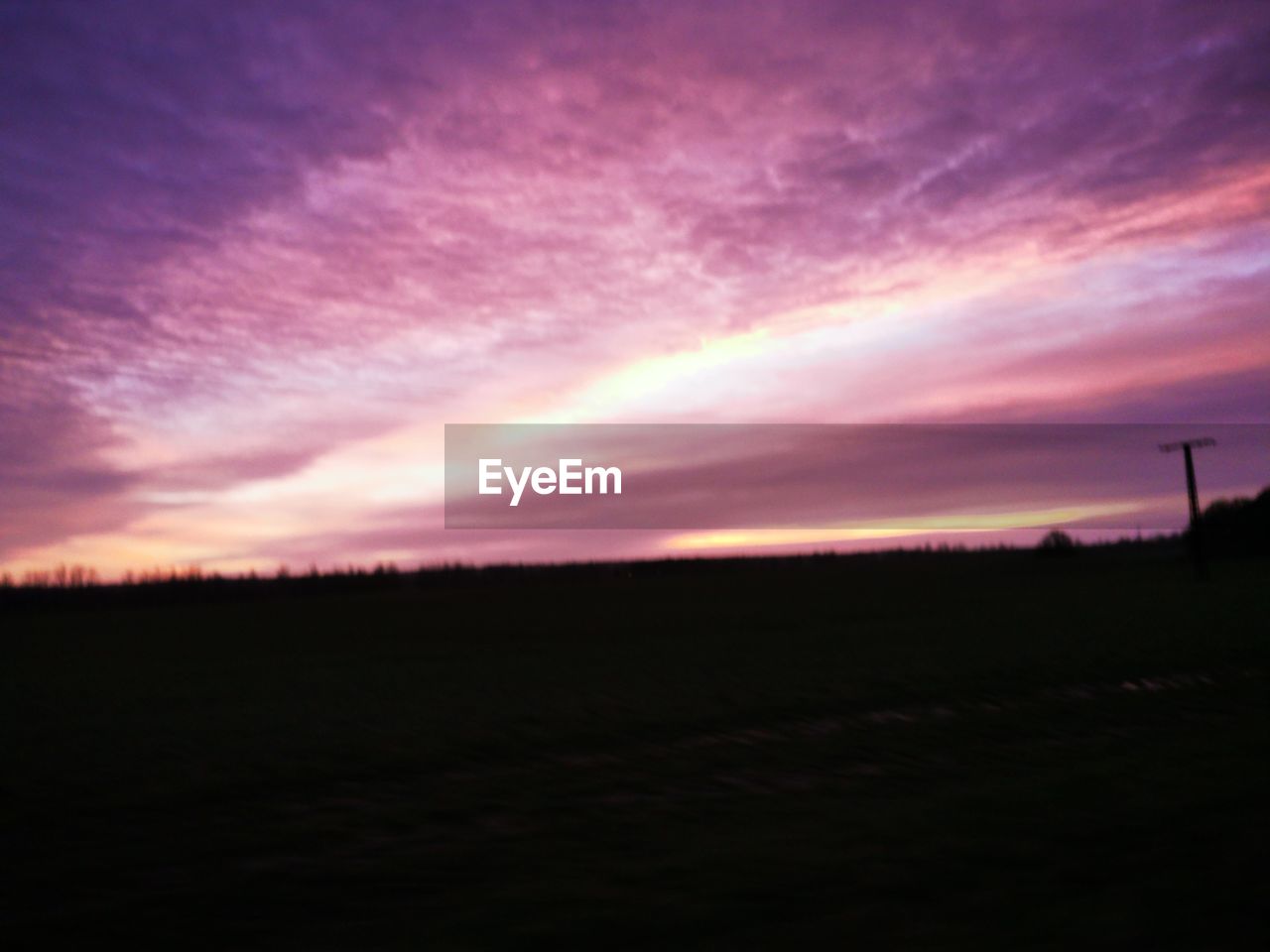 SCENIC VIEW OF SILHOUETTE LANDSCAPE AGAINST DRAMATIC SKY