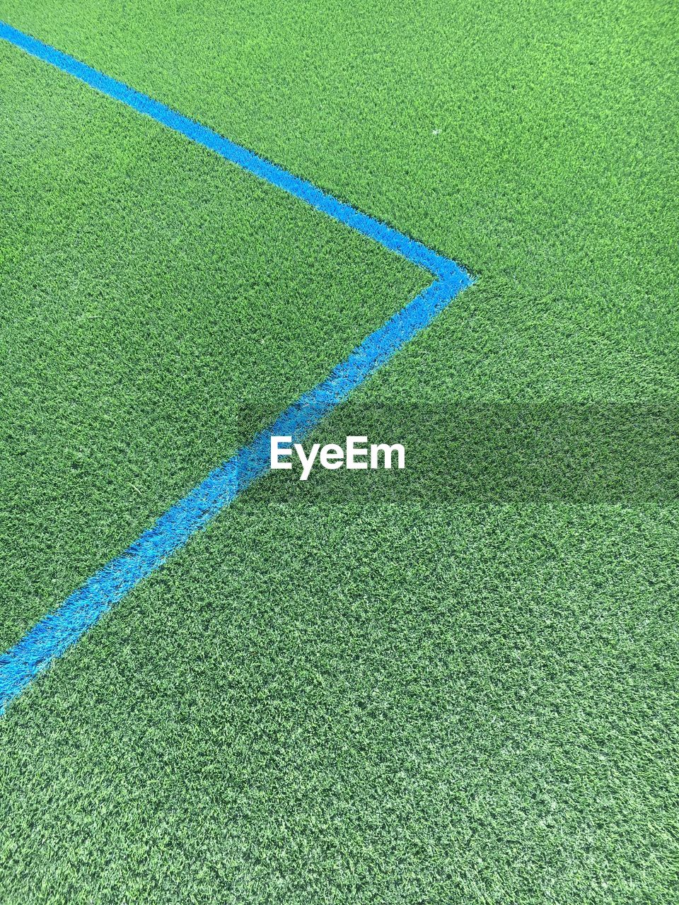 High angle view of blue single line on soccer field