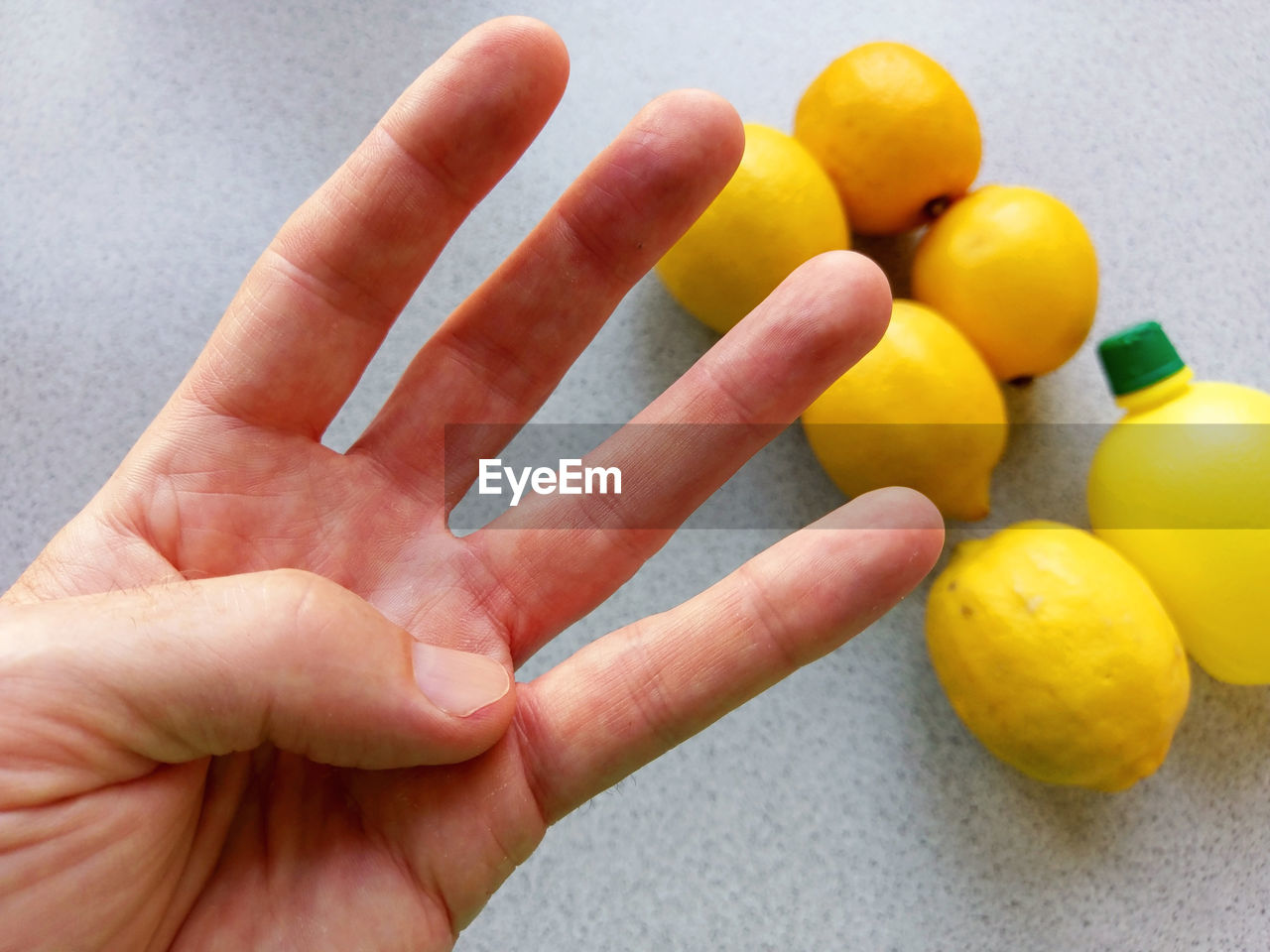 four fingers plus six lemons...well, almost 10 Body Part Citrus Fruit Close-up Counting Finger Food Food And Drink Freshness Fruit Hand Healthy Eating Human Body Part Human Finger Human Hand Lemon Lemon Concentrate Lemons Personal Perspective Still Life Ten Yellow Yellow Color