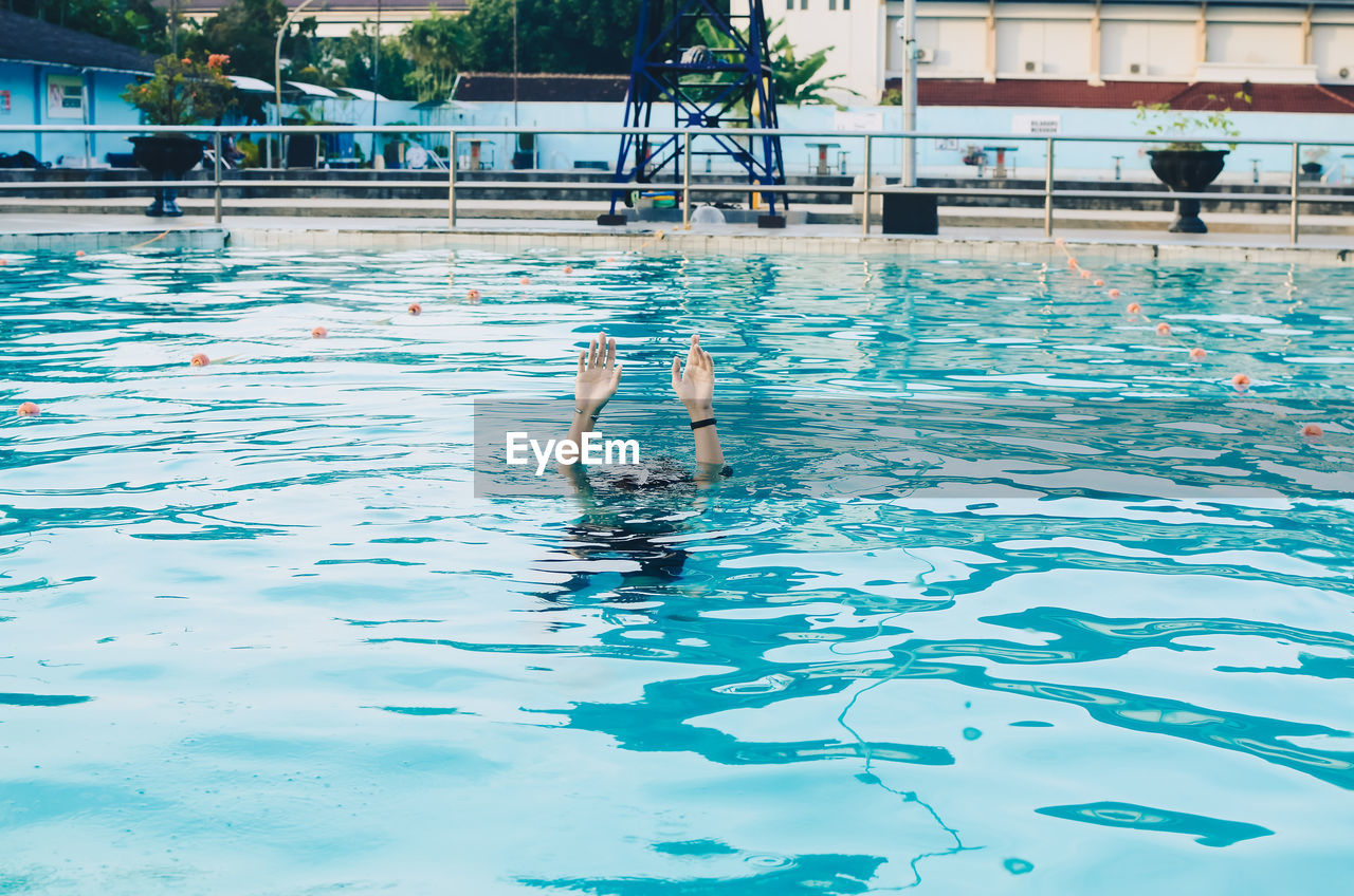 High angle view of swimming in pool